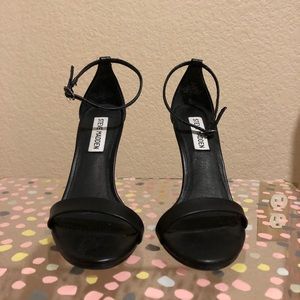 Steve Madden black strap heels.